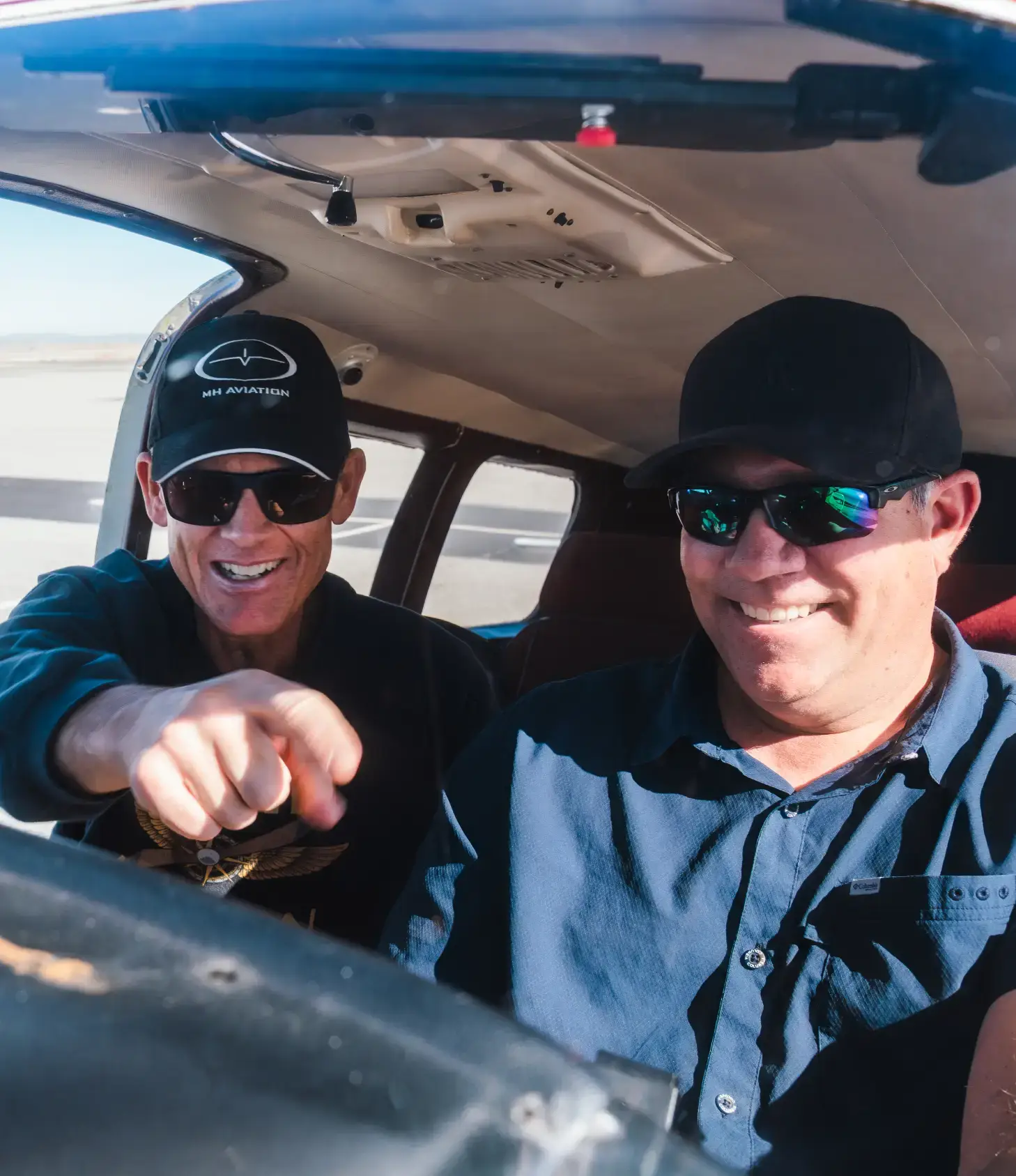 Instructor and student reviewing a flight plan