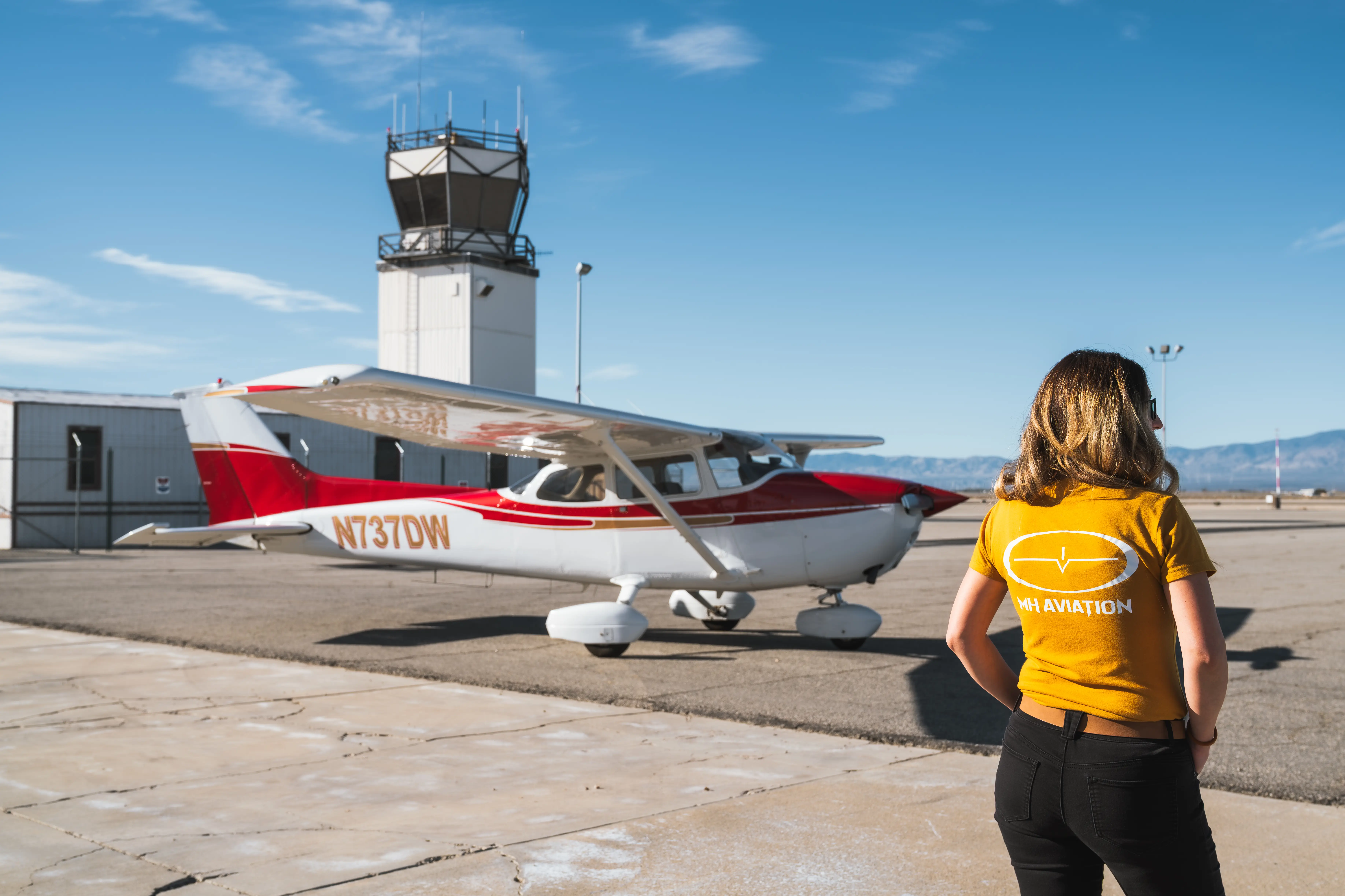 Student pilot inspecting the instruments of a Cessna 172 at MH Aviation