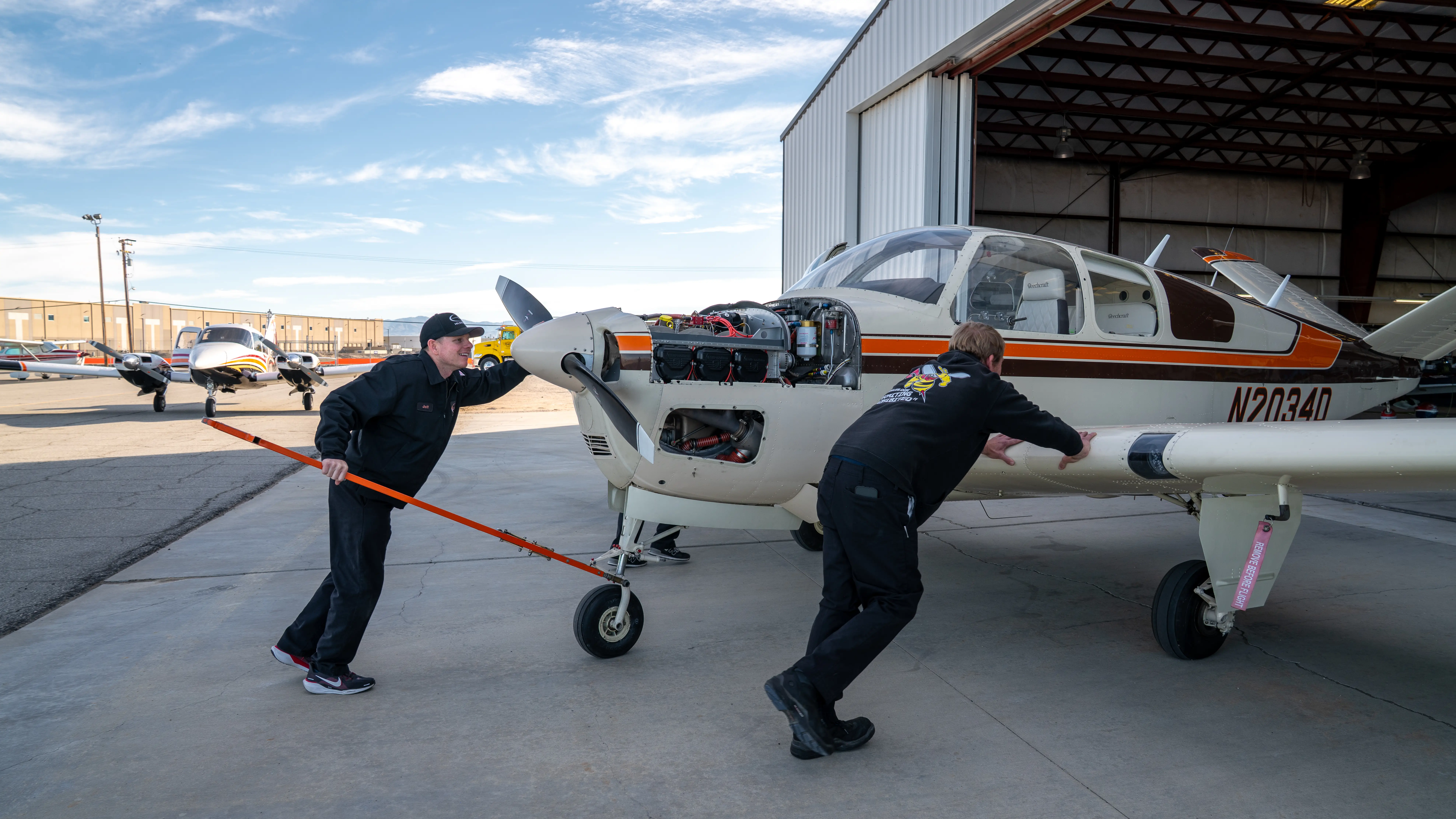 MH Aviation instructor with student inside cockpit